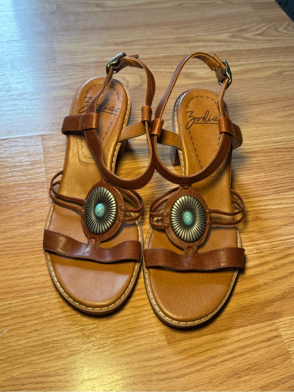 Zodiac Brown Leather T-Strap Sandals with Turquoise Accent